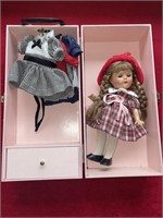 Vintage doll and wooden case with clothing