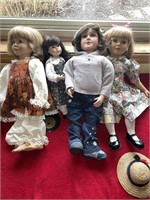 Four collectors dolls