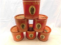 6 more empty Prince Albert Tobacco cans.