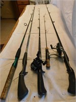 5 fishing rods, 2 with reels.