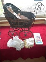 Doll buggy and antique doll and clothing