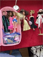 Collectible Barbie dolls, and carrying case