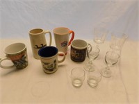 Lot of cups, mugs, wine glasses.