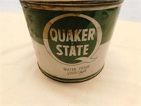Can of Quaker State, water proof lubricant.