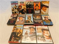 John Wayne 2 DVD's and 11 VHS tapes.