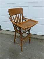 Vintage wooden high chair.