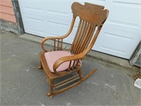 Vintage wooden adult rocking chair.