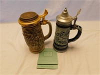 Two nice Avon beer steins, both are numbered.