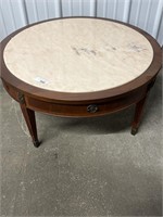 Round marble top coffee table