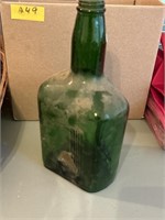 Green liquor bottle