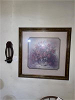 floral framed print and wall sconce