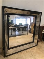 Oversized accent mirror with antiqued mirror
