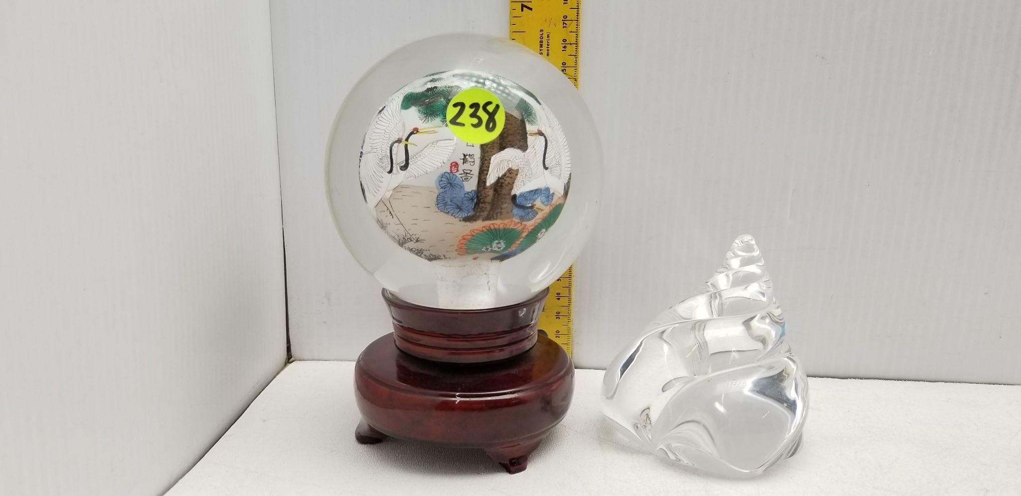 2 GLASS PAPER WEIGHTS 1 IS ON REVOLVING STAND