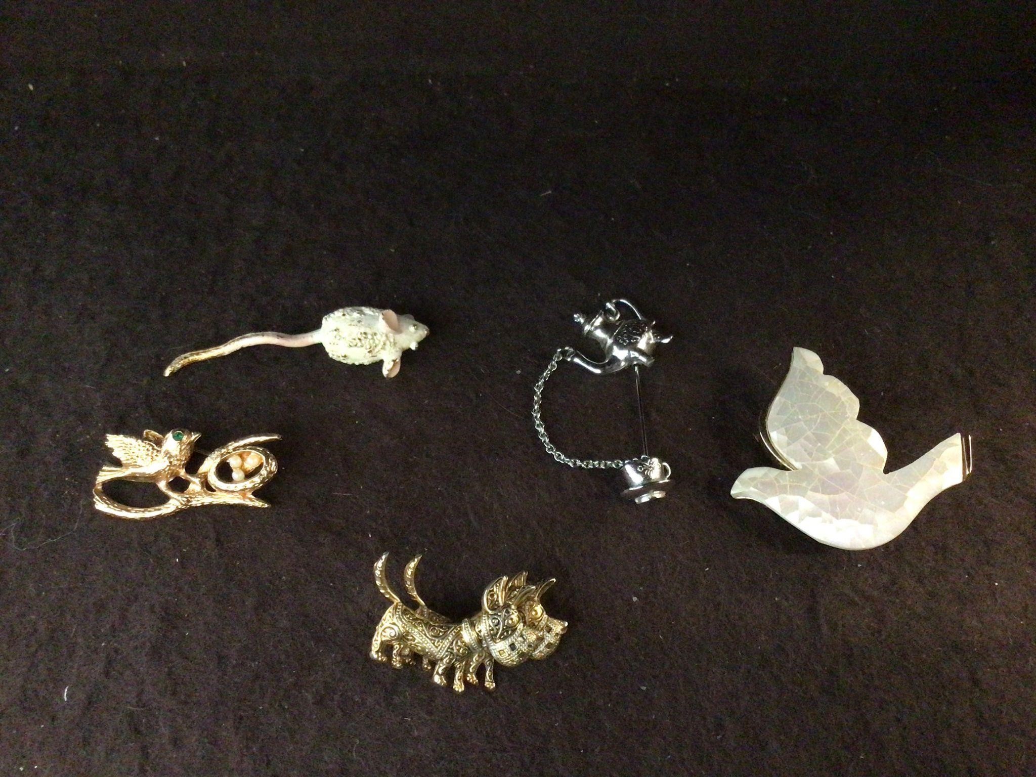 5 Brooches