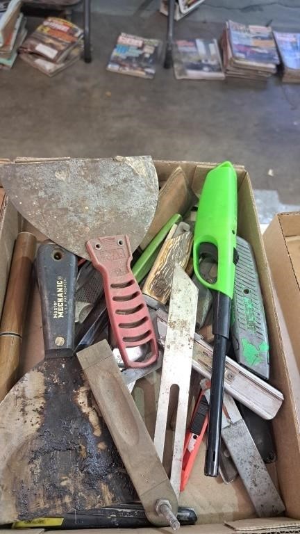 Flat of miscellaneous knives and putty knives.