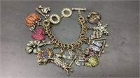 Heidi Daus link charm bracelet with 12 rhinestone