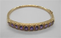 VINTAGE 14KT GOLD AND 11 AMETHYST BRACELET