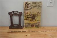 Bronze Picture Frame and Tin Sign