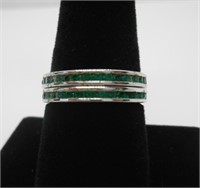 TWO STERLING SILVER BANDS WITH EMERALDS