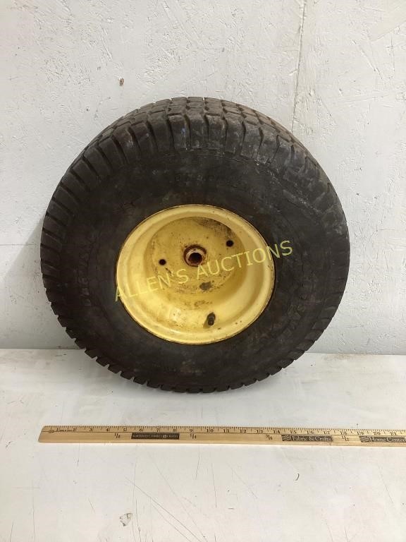 TIRE AND RIM. 20 x 8.00-8 NHS