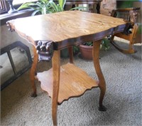 ANTIQUE PARLOR TABLE WITH LION HEAD CORNERS
