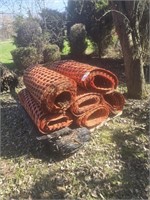 (7) ROLLS OF USED ORANGE PLASTIC SNOW FENCE