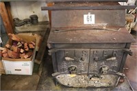 Fisher Wood Burning Stove with Miscellaneous Wood