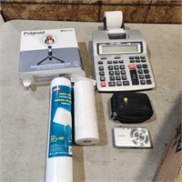 receipt paper, camera, tripod, calculator