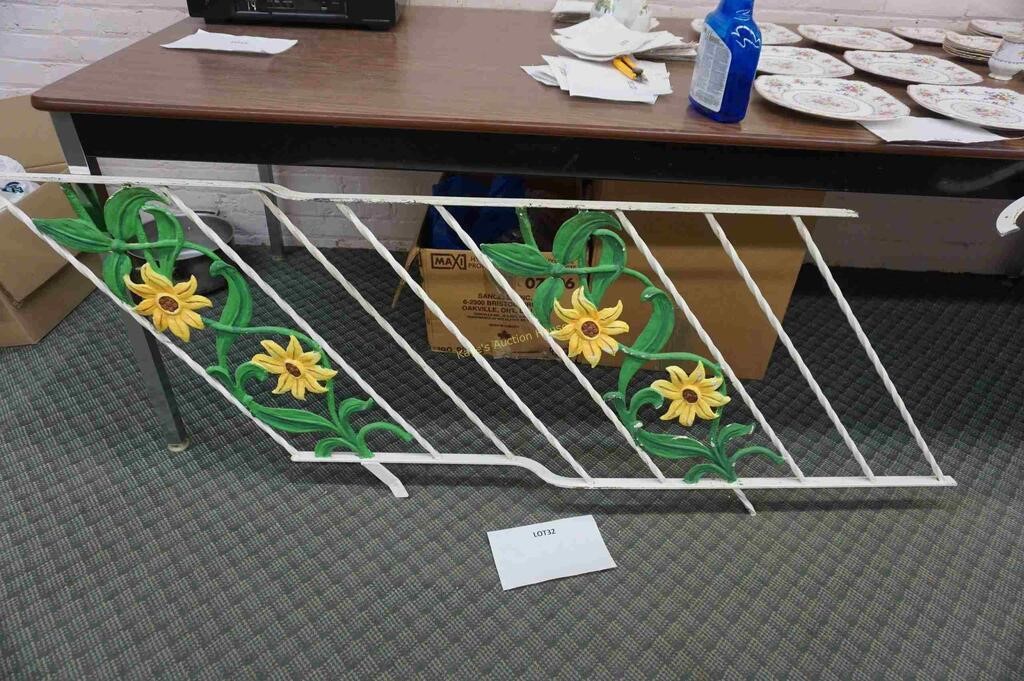 antique wrought iron stair rail with 2-sunflowers