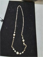 Gold tone chain and pearl necklace