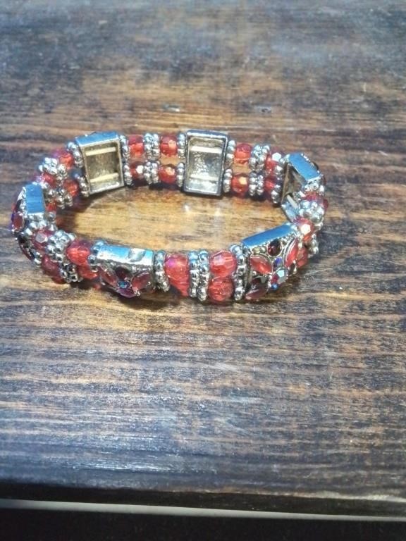 Silver tone and red stretch bracelet