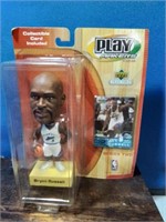 Playmakers bobblehead Bryan Russell with sports