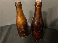 Brown coca cola bottles
