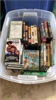 Tote of DVDs & VHS tapes