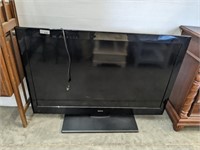 SANYO 55IN TV ON STAND, NO REMOTE