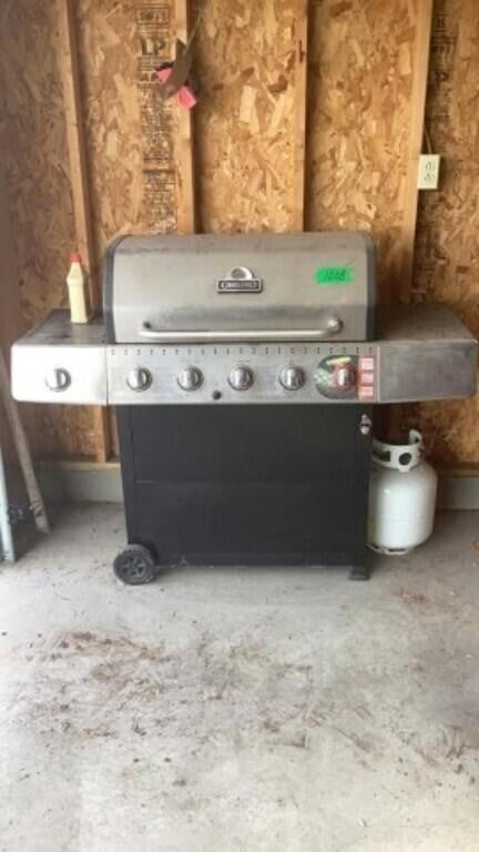 Grill Pro with extra propane bottle  LOOKS TO BE