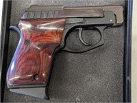 TAURUS PT-22 CAL LONG RIFLE WITH ROSEWOOD GRIPS,