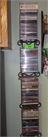 CD'S IN METAL WALL MOUNT CD HOLDER 6 1/2 x 39