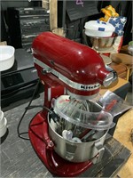 red kitchen aid mixer with attachments
