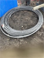 Quantity of 1" plastic hose