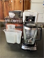 Mr. coffee and bun, coffee, pots, and blender
