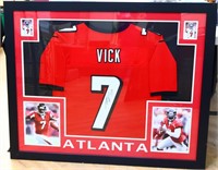 Framed signed Michael Vick Falcons jersey w/ COA