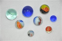 (8) old glass marbles up to 1 1/4"