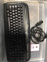 Cordless Logitech keyboard & extra computer plug