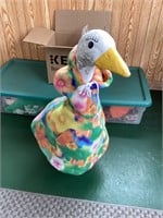 Concrete duck with decorative clothes