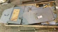 Side shields off an excavator cab