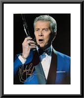 Michael "Lets Get  Ready To Rumble" Buffer signed