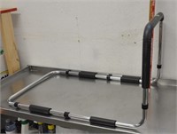 Adjustable bed safety bar