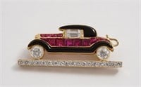 Diamond, ruby & enameled 18K pin of an antique car