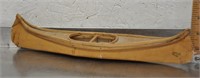 Handcrafted miniature canoe, dated